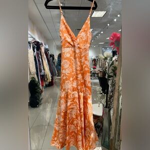 DANCE AND SWAY SATIN WRAP DRESS IN ORANGE